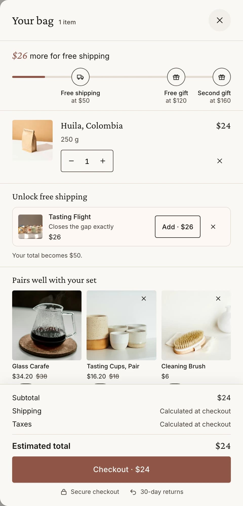A cart drawer with a free shipping bar, an offer that closes the gap and three items that pair well with the bag.