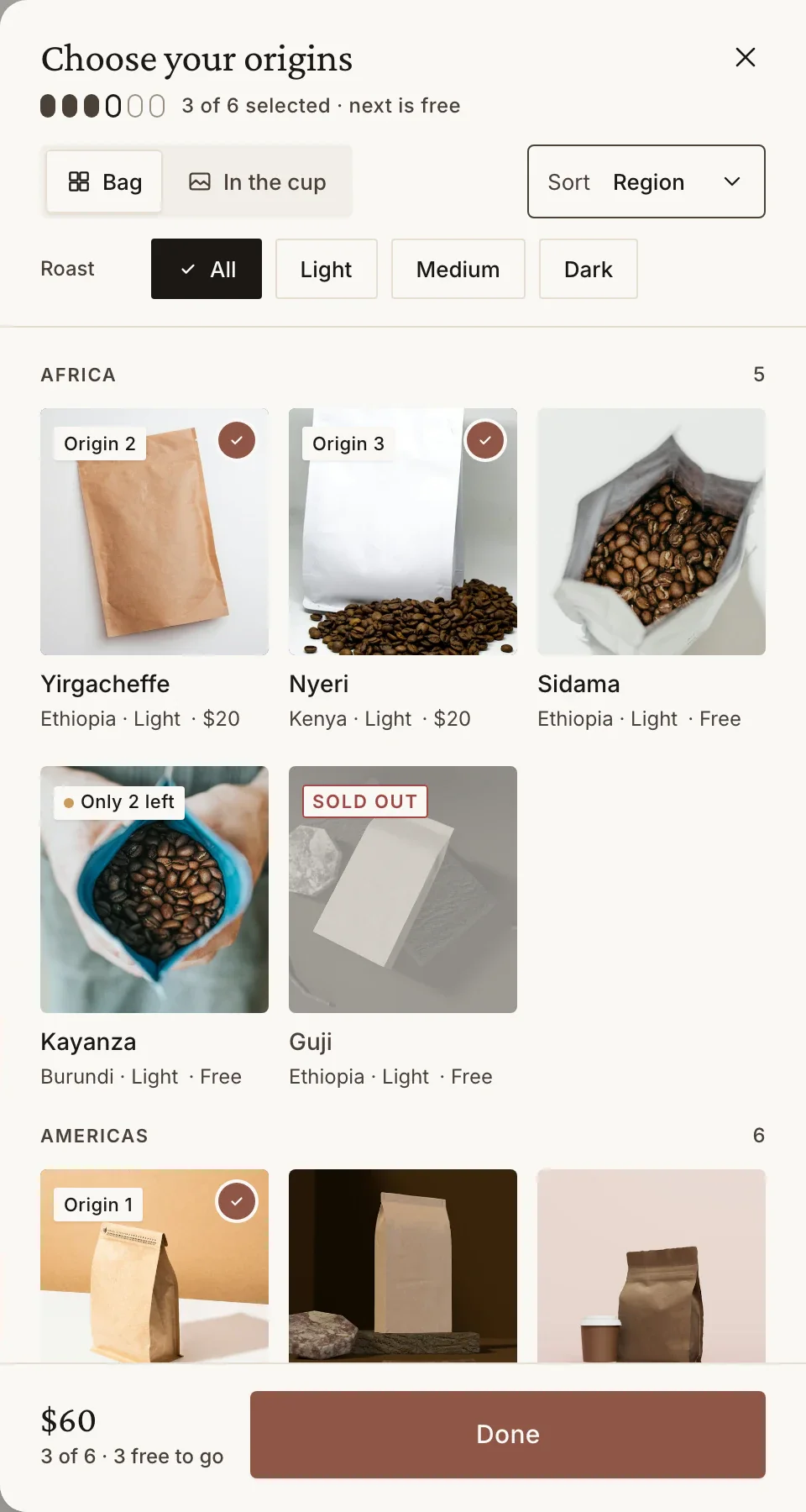The item picker: Roast filters, origins grouped by region, three chosen and a sold-out lot