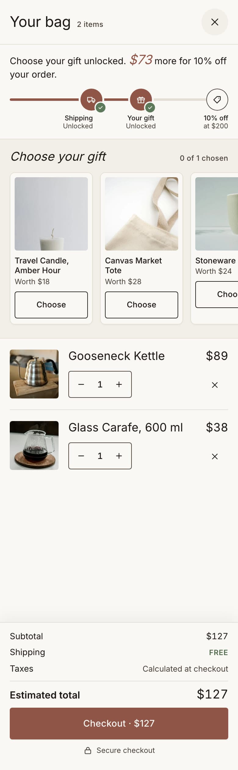 The cart drawer at $127 with the gift chooser open and no gift added yet.